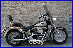 Harley Davidson Heritage/FatBoy OEM height 20 Lexan poly. Light tint windshield